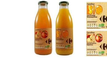 Bio orange in the glass fragments and Apple juice